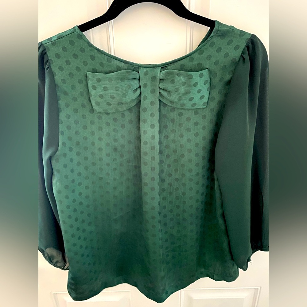 Chloe K polka dot top with bow in back